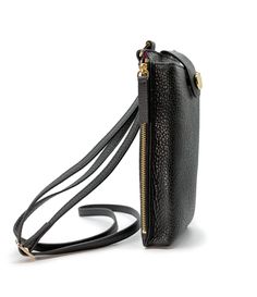 A miniature marvel of form and function, the Paris Phone Pouch holds all your necessary essentials securely in style. Made of gorgeous black Italian leather, it stores any sized phone in the main compartment, plus there’s also three credit card/ID pockets. Securing your phone in place with a top flap snap, this crossbody-style bag also has a side zipped section for keys and other must-haves. The Paris is perfect for a night out when a little bag goes a long way — just toss the adjustable 55" str Modern Black Bag With Hidden Phone Sleeve, Luxury Leather Wallet With Mobile Phone Bag, Modern Black Phone Bag For Business, Modern Formal Phone Bag With Cell Phone Pocket, Formal Black Shoulder Bag With Card Slots, Classic Black Phone Bag For Daily Use, Luxury Wallets With Mobile Phone Bag For Everyday Use, Black Phone Bag With Zipper Pocket For Travel, Black Phone Bag With Hidden Sleeve For Travel