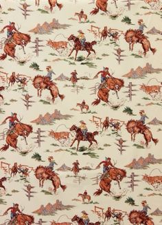 the fabric has horses and cowboys on it