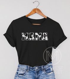 a black shirt with the word mama printed on it