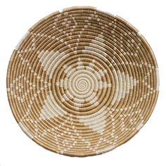 a brown and white woven basket on a white background with an oval design in the center