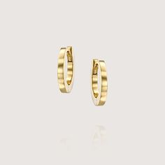 Our simple yet elegant iconic hoop earrings. Timeless and Classic, fits any outfit and any occasion. Made of 14K gold, open and close with a strong safe mechanism , simple and comfortable. Perfect for the everyday casual chic look, they can also be worn to top off an exquisite evening look. The earrings are sold as singles All of our jewelry is carefully handmade in our atelier To order by phone 972-72-2991000 Minimalist Polished Finish Hoop Earrings For Everyday Luxury, Modern Yellow Gold Huggie Earrings For Everyday, Modern 14k Gold Small Hoop Huggie Earrings, Luxury Everyday Huggie Hoop Earrings, Chic 14k Gold Hoop Earrings, Chic Yellow Gold Huggie Earrings, Chic 14k Gold Hoop Earrings For Formal Occasions, Luxury Everyday White Gold Huggie Earrings, Luxury Huggie Hoop Earrings For Everyday