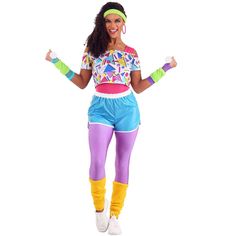 a woman in colorful clothing is posing for the camera