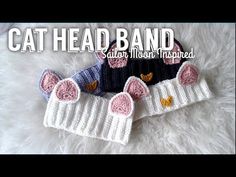 three knitted cat headbands on top of a white furnishing floor