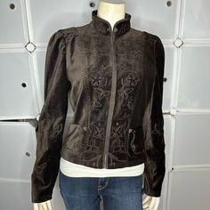 Elie Tahari Steampunk Victorian Embroidered Velvet Jacket Size Small Steampunk Fashion Borrows Heavily From Victorian-Era Clothing Styles, And Brooding Romantics Of The Late 19th Century. This Stunning Velvet Jacket By Elie Tahari Teatures Exceptional Attention To Quality And Details. Work Of Art. Condition: Excellent Pre-Owned Corseted Cropped Silhouette With Adjustable Criss Cross Tie On Back Mandarin Collar 2 Front Patch Pockets Hook And Eye Closures Embroidered Stitching, Metallic Accents Th Fitted Leather Jacket For Festival, Winter Festival Long Sleeve Leather Jacket, Winter Festival Fitted Leather Jacket, Fitted Leather Jacket For Winter Festival, Embroidered Leather Jacket For Fall, Fall Festival Long Sleeve Leather Jacket, Long Sleeve Leather Jacket For Fall Festivals, Fitted Embroidered Long-sleeved Leather Jacket, Fitted Long Sleeve Embroidered Leather Jacket