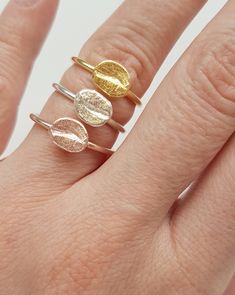 This is a dainty coffee bean ring ! The perfect gift for all coffee lovers ! You can wear it alone or stack it with other rings ! * Ring's band measure 15mm *The ring has been polished for a more elegant and chic look. *Choose your ring size during checkout! *Also available in rose gold and gold plated silver .Choose the finish you prefer during checkout! *This ring is made to order.Please allow me about 1 week to have it ready for you.It will come beautifully gift wrapped for you or your belove Stackable Oval Midi Rings As Gift, Stackable Oval Midi Rings For Gift, Stackable Oval Midi Rings Gift, Coffee Ring, Rose Gold And Gold, Black Tourmaline Ring, Amazonite Ring, Raw Crystal Ring, Chic Rings