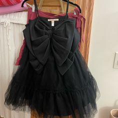 Adorable Black Tulle Dress With Satin Bow From Anthropologie From The Brand Hutch. I Wore This For New Years This Past Year And Have Never Gotten So Many Compliments On A Dress - She Is A Fun One! Perfect For An Event This Holiday Season. Size 4!! Black Tulle Dress, Tulle Party Dress, Black Tulle, Satin Bow, Hutch, Tulle Dress, Holiday Season, Colorful Dresses, Anthropologie