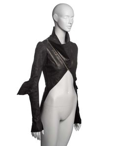 For Sale on 1stDibs - ▪ Brand: Rick Owens ▪ Creative Director: Rick Owens ▪ Collection: Fall-Winter 2009 ▪ Fabric: Black Leather ▪ Details: The jacket features a cropped silhouette Fitted Gothic Leather Jacket For Parties, Cropped Evening Outerwear For Fall, Gothic Long Sleeve Leather Jacket For Party, Fitted Leather Jacket For Party, Fitted Long Sleeve Leather Party Jacket, Fitted Long Sleeve Biker Jacket For Fall, Fitted Cropped Jacket For Winter Party, Cropped Outerwear For Night Out In Winter, Cropped Winter Outerwear For Night Out