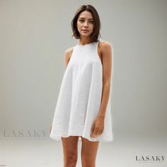 Lasaky - Loose and comfortable cotton sleeping dress with a round neckline, sexy backless design, and pure color home wear with binding straps. Solid Color Cotton Mini Dress For Vacation, Cotton Mini Dress For Beach In Solid Color, Summer Cotton Mini Dress Solid Color, Summer Cotton Mini Dress In Solid Color, Backless Mini Dress For Daywear, Solid Summer Sleep Dress, White Scoop Neck Dress For The Beach, White Scoop Neck Beach Dress, Sleeveless Mini Dress For Loungewear