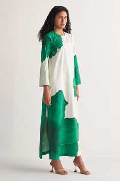 Green and white pure cotton woven long kurta with water color floral digital print.
Components: 1
Pattern: Digital printed
Type Of Work: Woven, Water color floral
Neckline: Round
Sleeve Type: Full
Fabric: Pure cotton
Color: Green, White
Other Details: 
Side slits
Occasion: Work - Aza Fashions Denim Background, Designer Anarkali Dresses, Tunics Online, Long Kurta, Kurta For Women, Fancy Kurti, Batik Fashion, Pakistani Dress Design, Stylish Dress Designs