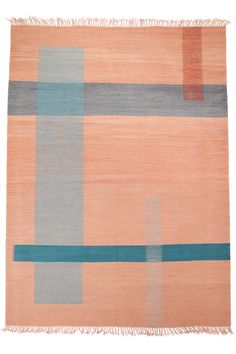 an orange and blue rug with fringes on it