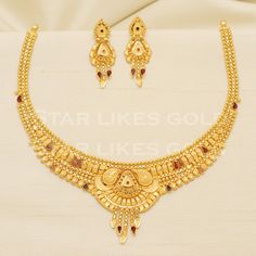 Adorn yourself with this elegant gold necklace, featuring a delicate chain and a stunning, handcrafted pendant. Its versatile design makes it a perfect accessory for both casual and formal looks, adding a subtle touch of glamour to your ensemble. 22kt yellow gold handmade necklace jewelry from Rajasthan India. Brand- StarLikesGoldIndia Weight- 18 grams approx. Metal- yellow gold real gold. Metal purity- 22 Karat. Max Length - Necklace 4 inches approx. Earrings - 3.3 centimeter approx Max Width- Gold Fine Jewelry Chain Necklace For Wedding, Elegant Yellow Gold Temple Necklace For Anniversary, 22k Yellow Gold Chain Necklace For Wedding, Gold Hallmarked Necklaces For Wedding, Formal Gold Necklace With Hand Set Details, Elegant Hand Set Yellow Gold Temple Necklace, Elegant Yellow Gold Temple Necklace Hand Set, Elegant Round Temple Necklace As A Gift, Elegant Temple Necklace As Gift