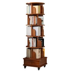 a tall wooden book shelf with many books on it's sides and two drawers