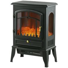 an electric stove with the door open and flames on it's sides, sitting in front of a white background