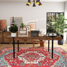 a living room filled with furniture and rugs on top of a wooden coffee table