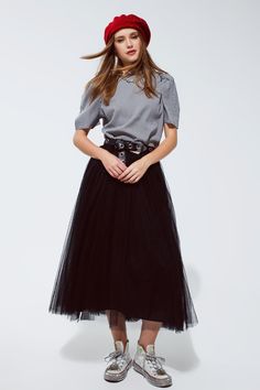 Discover the magic of our Black Tulle Midi Skirt, a piece that channels the elegance of a ballerina with the versatility for everyday style. Ballet-Inspired Elegance: This skirt's fluffy layers of soft tulle create a romantic, ethereal silhouette that echoes the grace of a dancer's attire. Comfort Meets Style: An elastic waistband ensures a snug, comfortable fit that adjusts to your body, allowing you to move freely and with confidence throughout your day. Material Mastery: Crafted from 100% pol Fluffy Tulle Skirt, Pink Sweater Dress, Tulle Skirt Black, Skirt With Elastic Waistband, Tulle Midi Skirt, The Ballerina, Black Tulle, Look Casual, Short Skirt