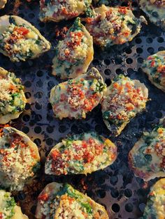 some food is sitting on a grill and ready to be cooked in the oven for consumption