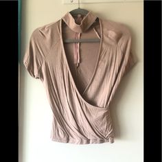 This Top Was Purchased From American Eagle But The Tag Is Don’t Ask Why. This Is One Size Fits All But I Put It Under Small Because It Fits Me Perfectly And That Is My Normal Size. Never Worn But Tags Aren’t Attached. Just Don’t Have Anywhere To Wear It To. It Is A Pinky Tan Color. Beige V-neck Top For Night Out, Brown Tops For Spring Night Out, Brown Top For Spring Night Out, Collar Top, Tan Color, Just Don, One Size Fits All, American Eagle Outfitters, American Eagle