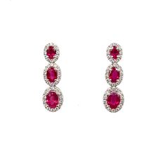 These stunning 3.31 ct Natural Ruby & Diamond earrings are sure to turn heads. The deep red hue of the rubies is perfectly complemented by the sparkling diamonds, creating a dazzling contrast that will make any outfit pop. Crafted with care and attention to detail, these earrings are both elegant and timeless. Perfect for a special occasion or as a luxurious gift for a loved one, these earrings are sure to be treasured for years to come. The earrings feature 80 round brilliant cut diamonds weighing 1.23 cts and graded E-F, VVS2-VS1 set in 18k. Ruby Diamond Earrings, Gem Ruby, Ruby Diamond, Natural Ruby, Sparkle Diamonds, Round Brilliant Cut Diamond, Chicago Il, Deep Red, Favorite Jewelry