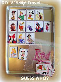 the disney travel guess game is displayed on a tray with other cards and magnets