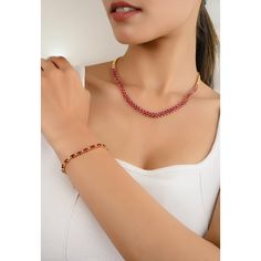 This exquisite choker necklace features a stunning 10.86ctw pear-cut ruby gemstone, radiating a deep, rich red hue. Designed for women with a taste for elegance, the necklace beautifully encircles the neck, making a bold and luxurious statement. Perfect for special occasions, this piece exudes timeless sophistication and grace. Ruby improves mental strength. Designed with a pear cut ruby set in prong settings making a necklace to make you stand out of the crowd. This is a perfect July birthstone Elegant Ruby Choker As A Gift, Elegant Red Choker For Formal Occasions, 14k Gold Choker Necklace, Gemstone Choker Necklace, Sterling Silver Choker Necklace, Sterling Silver Choker, Diamond Choker Necklace, Gemstone Choker, Silver Choker Necklace