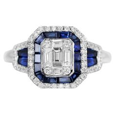 White Gold 14K Ring (Matching Earrings Available) Weight 4.27 gram Size 17 Diamond 52-Round 57-0,29-4/5- Diamond 5-25-0,28-4/5- Blue Sapphire 10-25-0,52 Т(5)/3- Blue Sapphire 8-25-0,49 Т(5)/3- With a heritage of ancient fine Swiss jewelry traditions, NATKINA is a Geneva based jewellery brand, which creates modern jewellery masterpieces suitable for every day life. It is our honour to create fine jewelry, and it’s for that reason that we choose to only work with high-quality, enduring materials t Blue Diamond Cluster Ring For Formal Occasions, Blue Emerald Cut Ring With Halo Design, Blue Cluster Ring For Formal Occasions, Formal Blue Diamond Cluster Ring, Formal Blue Cluster Ring, Blue Diamond Emerald-cut Cluster Ring, Blue Emerald Cut Cluster Ring With Center Stone, Blue Cluster Rings In Classic Style, Blue Cluster Diamond Ring