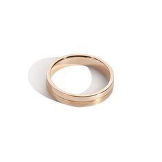 The Every Love series is a gender-neutral collection for all walks of love. The Horizontal Better Half Band features a 50/50 high polish / matte finish separated by a groove at the band's center. Metal: 14K Yellow Gold, 14K Rose Gold, 14K White Gold, 18K Yellow Gold, or Platinum Band Width: 4mm This piece is made to order in NYC. For questions, contact us. Timeless Promise Band With Polished Finish, Timeless Polished Promise Band, Modern 14k Gold Promise Bands, Modern White Gold Wedding Ring With Thick Band, Minimalist Polished Promise Band, Modern Gold Promise Band, Modern Double Band In Yellow Gold, Elegant Jewelry With Brushed Finish For Anniversary, Modern Wedding Ring With Polished Round Band