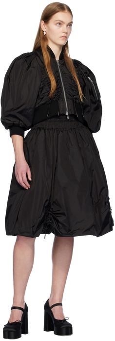 Insulated nylon taffeta skirt. Ruching and adjustable self-tie drawstring throughout. · Elasticized waistband · Two-pocket styling · Fully lined Supplier color: Black Ruched Midi Skirt, Taffeta Skirt, Black Midi Skirt, Black Crop, Balloon Sleeves, Stand Collar, Welt Pockets, Rib Knit, Midi Skirt