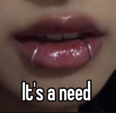 a woman's lips with the words it's a need