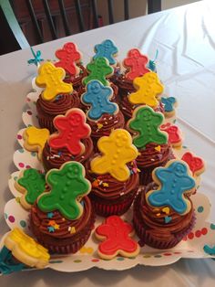 cupcakes are arranged in the shape of teddy bears