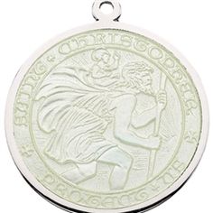 a silver medal with an angel on it