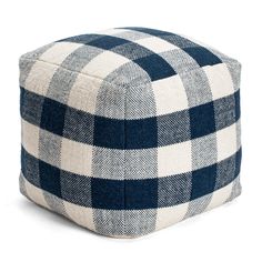 a blue and white checkered poufce