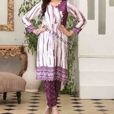 Brand New Stitched, Ready-Made, Embellished, Tie & Dye Printed, 2-Piece Silk Shalwar Kameez 2 Piece Suit Ready-Made / Stitched / Ready To Wear Two Piece Includes: 1. Shirt: Full-Sleeve Silk Fabric Kameez, Printed Tye & Dye Design On Front & Back Of Shirt With Pearls & Design Cut Neck, And Pearls On Front Shirt Daaman. 2. Shalwar: Silk Fabric Shalwar/Pant With Fully Printed Tie & Dye Shalwar Color(S): Grape-Purple, White Clothing Type(S): Kurti/Kameez, Shalwar/Trouser Available In Sizes: Medium 41 Bust/Chest (Us 14) Large 46 Bust/Chest (Us 20) Measurements: Medium 41" Size Shirt/Kameez: Bust-Round: 41.5" Waist-Round: 39.5" Hip-Round: 46" Length: 37" Medium S Fitted Mulmul Salwar Kameez With Bandhani Print, Bandhani Print Salwar Kameez In Mulmul, Fitted White Cambric Lawn Suit, Purple Cambric Sets For Eid, White Anarkali Kurta With Bandhani Print, Anarkali White Kurta With Bandhani Print, White Anarkali Style Cambric Palazzo Set, White Fitted Unstitched Cambric Suit, White Cambric Palazzo Set With Dabka Work