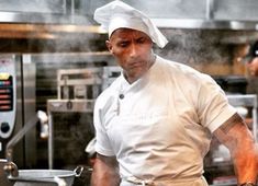 a man in a chef's hat is preparing food