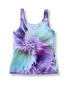 Women's Old Navy tank ice dyed using procion dyes Size M Process: Tank pre-washed, then soaked in a Soda Ash solution to aide in dye adherence to the fabric, for at least 25 minutes.  Wrung out by hand, spiraled while damp Draped over small bowl Dye placed directly on garment Colander full of ice placed on top of garment Allowed to batch 24-36 hours  Hand rinsed, hot water soaks with Dawn, machine washed with hot water Dyes are permanently adhered to the garment so no special washing instruction Acid Wash Hand-dyed Summer Tank Top, Sleeveless Tie-dye Tops For Summer, Spring Hand Dyed Tie Dye Tank Top, Playful Cheap Tie-dye Tops, Spring Tie-dye Hand-dyed Tank Top, Ice Dyeing, Laundry Detergent, Small Bowls, Tank Tops Women