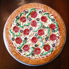 a pizza sitting on top of a wooden plate