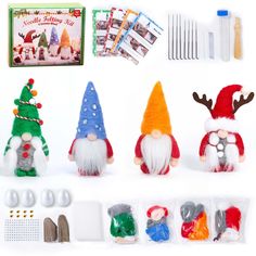 an assortment of christmas gnomes are displayed