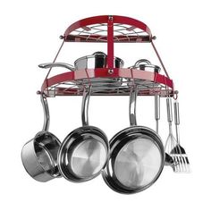 a red rack with pots and pans hanging from it's sides, holding utensils