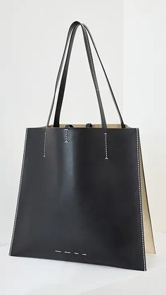 Mansur Gavriel Large Tote Bag | Shopbop Leather Shoulder Box Bag, Designer Leather Box Bag For Everyday Use, Leather Shoulder Box Bag With Dust Bag, Black Rectangular Calf Leather Shoulder Bag, Black Calf Leather Rectangular Shoulder Bag, Black Calf Leather Shoulder Bag With Smooth Grain, Large Leather Box Bag For Everyday, Large Black Box Bag For Everyday Use, Large Designer Leather Box Bag