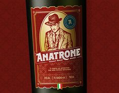 a bottle of red wine with an image of a man in a hat on it