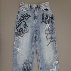 Never Worn, Fits Tight And Waist, Loose At Thighs. Edgy Blue Bottoms For Streetwear, Y2k Style Ripped Blue Bottoms, Distressed Blue Y2k Bottoms, Y2k Style Distressed Blue Bottoms, Y2k Distressed Blue Bottoms, Y2k Blue Ripped Bottoms, Y2k Blue Distressed Bottoms, Edgy Blue Bottoms For Spring, Casual Denim Bottoms With Graffiti Print