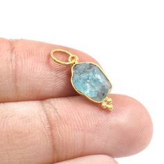 Raw Apatite Charm, 18k Gold Charm, Handmade Charm Pendant, Gemstone Charm, Raw Apatite Gold Charm, Birthstone Charm Pendant, Dainty Charm Material  Metal = 18k Gold Gemstone = Raw Apatite  Stone Color = Blue Raw Stone Size = 6X12 mm Stone Shape = Raw Stone Creation = Natural Total Charm weight = 640 Milligram  Charm Bail Size = 4.5 mm Product Making = Handmade  Thank You Visiting My Shop. Aquamarine Gemstone Jewelry For Jewelry Making, Blue Tourmaline Gemstone Jewelry, Apatite Stone, Handmade Charms, Birthstone Charms, Raw Stone, Green Stone, Gold Charm, Charm Pendant