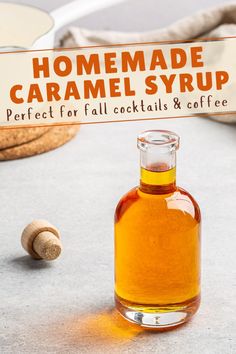 a bottle of homemade caramel syrup next to some cookies