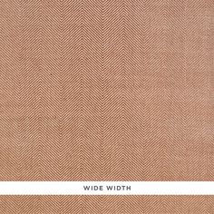 an orange and white herringy fabric with the words wide width on it