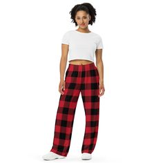 Get the comfort of pajamas in this stylish pair of wide-leg pants. With the adjustable waist and stretchy fabric, it’s like your favorite sweatpants but better. • Relaxed unisex fit • Practical side pockets • Elastic waistband with a white drawstring • Can be worn on the waist or on the hips • Premium knit mid-weight jersey fabric • 95% polyester, 5% elastane (fabric composition may vary by 1%) • Fabric weight: 6.19 oz/yd2 (210 g/m2) (weight may vary by 5%)Size guide WAIST (inches) HIPS (inches) Red Plaid Pants, Christmas Pajama Pants, Pajamas Comfy, Pants With Pockets, Elastane Fabric, Plaid Pants, Lounge Pants, Check Pattern, Buffalo Plaid