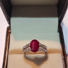 14k solid white gold natural oval shaped Mozambique ruby and round brilliant cut natural diamonds gemstones ring. 1. The weight of the natural ruby gemstone used in the ring =2.15 cts. 2. The weight of the natural round brilliant diamonds gemstones used in the ring =0.60 cts. 3. The weight of the 14k solid white gold used in the ring =3.650 grms. The ruby is the birthstone for the people born in the month of July. The design of the ring is very nice and beautiful. I have used all my skills and e Oval Ruby Ring With Vvs Clarity Diamond, Oval Ruby Diamond Ring With Prong Setting, Oval Lab-created Ruby Diamond Ring In White Gold, Oval Diamond Ring With Lab-created Ruby Accents, Red Oval Diamond Ring With Accents, Oval Red Diamond Ring With Accents, Red Oval Sapphire Ring With Brilliant Cut, Silver Diamond Ring With Oval Lab-created Ruby, Silver Diamond Ring With Lab-created Ruby In Oval Shape