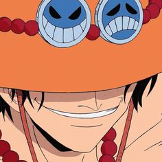 an anime character with big eyes and orange hair wearing red beads on his head, smiling at the camera