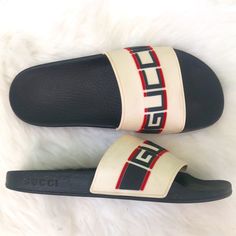 Authentic Gucci Unisex Black White Open Toe Flat Slip On Slide Sandals Brand: Gucci Condition: Good Condition Color: Black White White Gucci Sandals For Summer, White Gucci Sandals With Branded Insole, White Gucci Open Toe Sandals, Gucci Open Toe Slides For Beach, Gucci Casual Beach Slides, Casual Gucci Slides For The Beach, Gucci Slide Sandals For Summer, Gucci Summer Slide Sandals, Gucci Luxury Slide Sandals