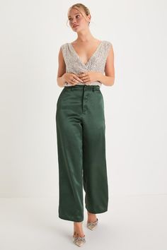 A modern look like the Lulus Sleek Statement Emerald Green Satin High Rise Wide-Leg Trousers is sure to make your look undeniably impressive! Staying chic is easy with these satin pants that feature a high-rise fit, belt loops, and a hidden zipper fly with a top clasp closure. Trendy wide pant legs boast side seam pockets and fall to ankle-length hems. Fit: This garment fits true to size. Length: Ankle length. Size medium Inseam: 29.50 Front Rise: 12.50 Waist: Fitted - very fitted at natural wai Pants Formal Outfit, Emerald Pants, Satin Trousers, Lulu Fashion, Satin Pants, Wide Pants, Green Satin, Formal Outfit, Bottom Clothes