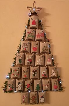 a christmas tree made out of small packages