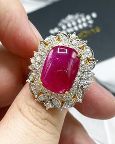 What you see in the pictures, is what you will get! No duplicates or twins! One of a kind EXTREMELY GORGEOUS AND RARE CERTIFIED NO-GLASS-FILLING, GENTLE HEAT ONLY, VIVID RED, BURMESE RUBY RING. This ruby is so rare! With stunning vivid red color and excellent depth and translucent quality, VS clarity. Rare BURMESE, signature RED Color, EXTREMELY BEAUTIFUL! With SUBSTANTIAL double halo of brilliant round, F/VS diamonds. Set in a LUXURIOUS DESIGNED, 18K solid yellow gold ring!! One of a kind! ONE Ruby Ring Vintage, Burmese Ruby, Ruby Ring Gold, Special Necklace, Double Halo, Vs Diamond, Gem Ring, Button Jewelry, White Gold Engagement Rings